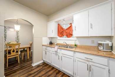 Welcome home to this charming 3-bedroom home with a spacious on L W Clapp Memorial Golf Course in Kansas - for sale on GolfHomes.com, golf home, golf lot