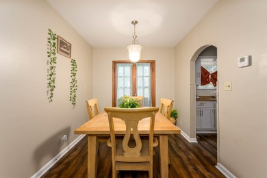 Welcome home to this charming 3-bedroom home with a spacious on L W Clapp Memorial Golf Course in Kansas - for sale on GolfHomes.com, golf home, golf lot