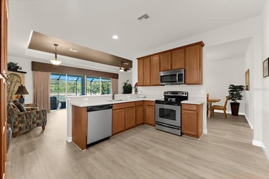 RESORT STYLE LIVING WITH STUNNING WATER VIEWS - 3BR/2BA in Gated on River Strand Golf and Country Club At Heritage Harbour  in Florida - for sale on GolfHomes.com, golf home, golf lot