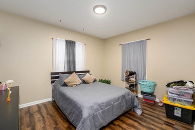 Welcome home to this charming 3-bedroom home with a spacious on L W Clapp Memorial Golf Course in Kansas - for sale on GolfHomes.com, golf home, golf lot