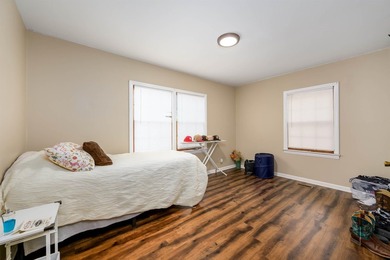 Welcome home to this charming 3-bedroom home with a spacious on L W Clapp Memorial Golf Course in Kansas - for sale on GolfHomes.com, golf home, golf lot