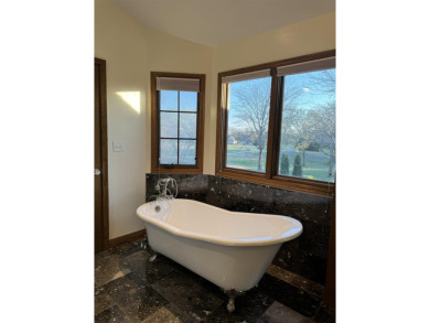 This fabulous 4+ bedroom, 4 bathroom home is located in on Tallgrass Country Club in Kansas - for sale on GolfHomes.com, golf home, golf lot