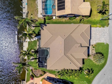 Punta Gorda Isles! Stunning 3 bedroom plus office, 3 bath, 3-car on Saint Andrews South Golf Club in Florida - for sale on GolfHomes.com, golf home, golf lot