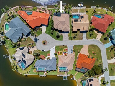 Punta Gorda Isles! Stunning 3 bedroom plus office, 3 bath, 3-car on Saint Andrews South Golf Club in Florida - for sale on GolfHomes.com, golf home, golf lot