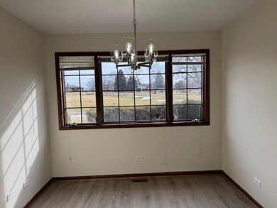 This rare first-floor 2-bedroom, 2-bath condo offers one of the on Oak Hills Country Club in Illinois - for sale on GolfHomes.com, golf home, golf lot