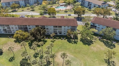 Beautiful views of golf course, this 2 bedroom/2 bath unit has on Flamingo Lakes Country Club in Florida - for sale on GolfHomes.com, golf home, golf lot