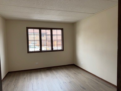 This rare first-floor 2-bedroom, 2-bath condo offers one of the on Oak Hills Country Club in Illinois - for sale on GolfHomes.com, golf home, golf lot