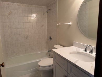 This rare first-floor 2-bedroom, 2-bath condo offers one of the on Oak Hills Country Club in Illinois - for sale on GolfHomes.com, golf home, golf lot