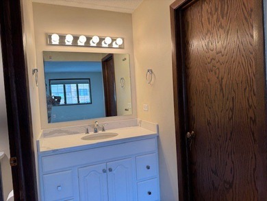 This rare first-floor 2-bedroom, 2-bath condo offers one of the on Oak Hills Country Club in Illinois - for sale on GolfHomes.com, golf home, golf lot