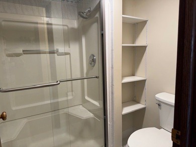 This rare first-floor 2-bedroom, 2-bath condo offers one of the on Oak Hills Country Club in Illinois - for sale on GolfHomes.com, golf home, golf lot