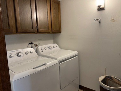 This rare first-floor 2-bedroom, 2-bath condo offers one of the on Oak Hills Country Club in Illinois - for sale on GolfHomes.com, golf home, golf lot