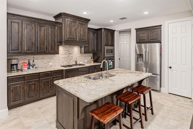 Here is your home to put down roots in established Stonebridge on Stonebridge Ranch Country Club - Dye in Texas - for sale on GolfHomes.com, golf home, golf lot