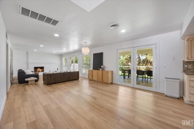 Stunning 4 bedroom, 3 bathroom home sitting on just shy of a on Kern River Golf Course in California - for sale on GolfHomes.com, golf home, golf lot