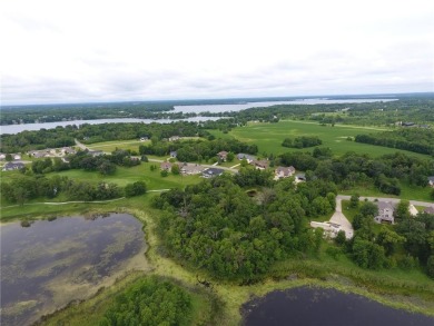 Nestled on a prime .82-acre parcel just steps from the serene on Geneva Golf Club in Minnesota - for sale on GolfHomes.com, golf home, golf lot