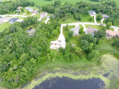 Nestled on a prime .82-acre parcel just steps from the serene on Geneva Golf Club in Minnesota - for sale on GolfHomes.com, golf home, golf lot