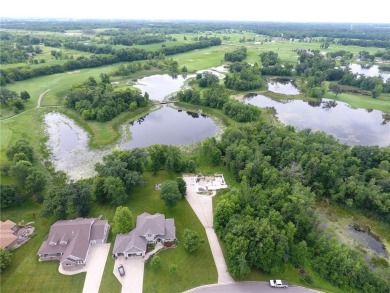 Nestled on a prime .82-acre parcel just steps from the serene on Geneva Golf Club in Minnesota - for sale on GolfHomes.com, golf home, golf lot
