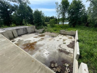 Nestled on a prime .82-acre parcel just steps from the serene on Geneva Golf Club in Minnesota - for sale on GolfHomes.com, golf home, golf lot