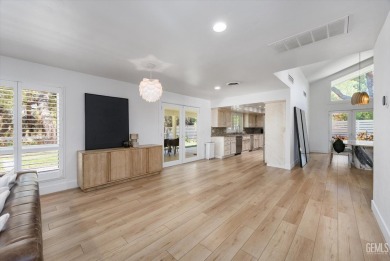 Stunning 4 bedroom, 3 bathroom home sitting on just shy of a on Kern River Golf Course in California - for sale on GolfHomes.com, golf home, golf lot