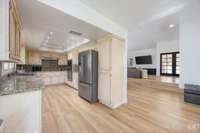 Stunning 4 bedroom, 3 bathroom home sitting on just shy of a on Kern River Golf Course in California - for sale on GolfHomes.com, golf home, golf lot