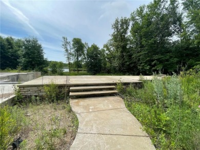 Nestled on a prime .82-acre parcel just steps from the serene on Geneva Golf Club in Minnesota - for sale on GolfHomes.com, golf home, golf lot