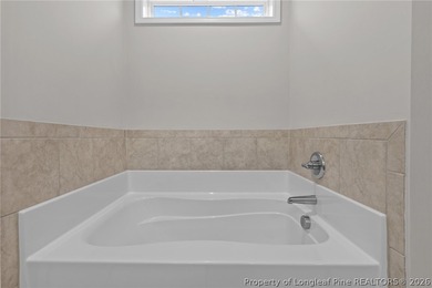 Welcome to this beautiful 4-bedroom, 3-bath home located in The on The Carolina Club in North Carolina - for sale on GolfHomes.com, golf home, golf lot