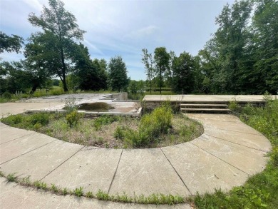 Nestled on a prime .82-acre parcel just steps from the serene on Geneva Golf Club in Minnesota - for sale on GolfHomes.com, golf home, golf lot