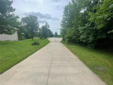 Nestled on a prime .82-acre parcel just steps from the serene on Geneva Golf Club in Minnesota - for sale on GolfHomes.com, golf home, golf lot