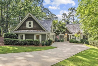 Experience the ultimate lakefront living with this stunning on Reynolds Lake Oconee - The Oconee in Georgia - for sale on GolfHomes.com, golf home, golf lot