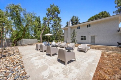 Stunning 4 bedroom, 3 bathroom home sitting on just shy of a on Kern River Golf Course in California - for sale on GolfHomes.com, golf home, golf lot