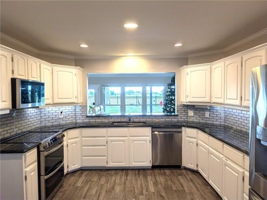 This home has an excellent location! Three blocks from Corpus on Oso Beach Municipal Golf Course in Texas - for sale on GolfHomes.com, golf home, golf lot