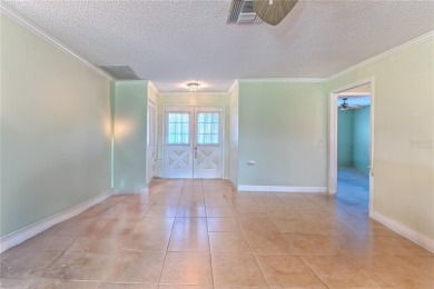 Welcome to this beautifully maintained expanded Oakmont model on Timber Pines Golf Course in Florida - for sale on GolfHomes.com, golf home, golf lot