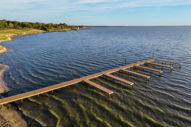 Exceptional waterfront lot in a prestigious gated community! on Cedar Creek Country Club in Texas - for sale on GolfHomes.com, golf home, golf lot