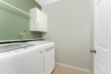 Step into this beautiful, like-new modern 4-bedroom, 2-bath home on Deep Creek Golf Club in Florida - for sale on GolfHomes.com, golf home, golf lot