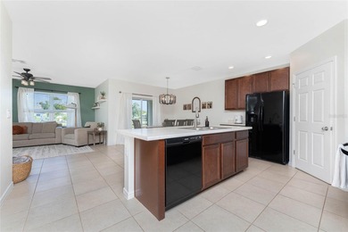 Step into this beautiful, like-new modern 4-bedroom, 2-bath home on Deep Creek Golf Club in Florida - for sale on GolfHomes.com, golf home, golf lot