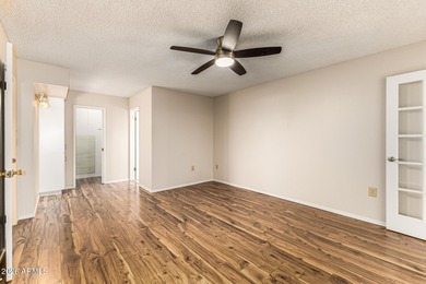 Welcome to relaxed desert living in the heart of Sun City, one on Sun City Lakes West and East in Arizona - for sale on GolfHomes.com, golf home, golf lot