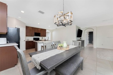 Step into this beautiful, like-new modern 4-bedroom, 2-bath home on Deep Creek Golf Club in Florida - for sale on GolfHomes.com, golf home, golf lot