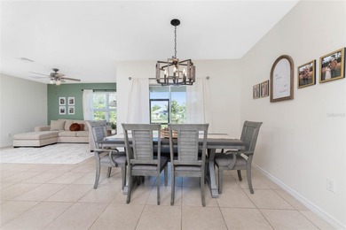 Step into this beautiful, like-new modern 4-bedroom, 2-bath home on Deep Creek Golf Club in Florida - for sale on GolfHomes.com, golf home, golf lot