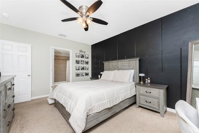 Step into this beautiful, like-new modern 4-bedroom, 2-bath home on Deep Creek Golf Club in Florida - for sale on GolfHomes.com, golf home, golf lot