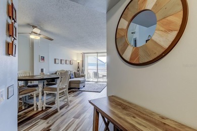 Discover this light-filled and spacious end-unit condo in the on Feather Sound Country Club in Florida - for sale on GolfHomes.com, golf home, golf lot