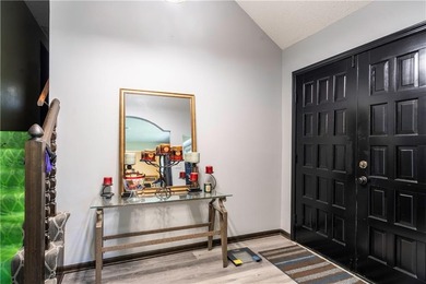 This spacious 4-bedroom residence offers exceptionally large on National Golf Club of Kansas City in Missouri - for sale on GolfHomes.com, golf home, golf lot