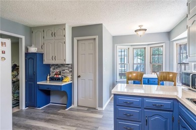 This spacious 4-bedroom residence offers exceptionally large on National Golf Club of Kansas City in Missouri - for sale on GolfHomes.com, golf home, golf lot