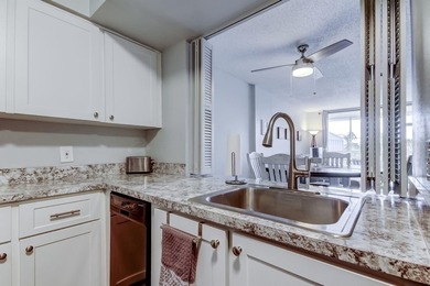 Discover this light-filled and spacious end-unit condo in the on Feather Sound Country Club in Florida - for sale on GolfHomes.com, golf home, golf lot
