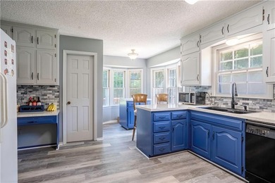 This spacious 4-bedroom residence offers exceptionally large on National Golf Club of Kansas City in Missouri - for sale on GolfHomes.com, golf home, golf lot