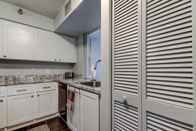 Discover this light-filled and spacious end-unit condo in the on Feather Sound Country Club in Florida - for sale on GolfHomes.com, golf home, golf lot