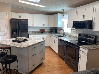 Listed by the Official Sales Team of Cypress Lakes Village on Big Cypress Golf and Country Club in Florida - for sale on GolfHomes.com, golf home, golf lot