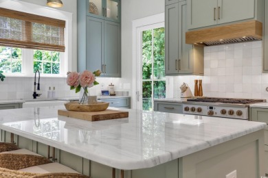 Gorgeous, custom-built home with 4 bedrooms, 3  1/2  bathrooms on Tidewater Golf Club and Plantation in South Carolina - for sale on GolfHomes.com, golf home, golf lot