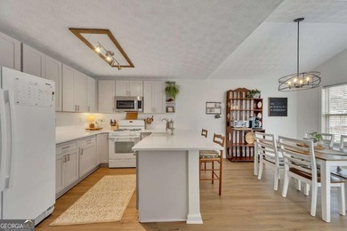 Welcome home to 2061 Greenhill Pass in Bridgemill, an enchanting on Bridgemill Golf Club in Georgia - for sale on GolfHomes.com, golf home, golf lot