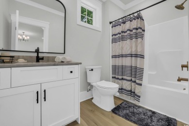 Gorgeous, custom-built home with 4 bedrooms, 3  1/2  bathrooms on Tidewater Golf Club and Plantation in South Carolina - for sale on GolfHomes.com, golf home, golf lot