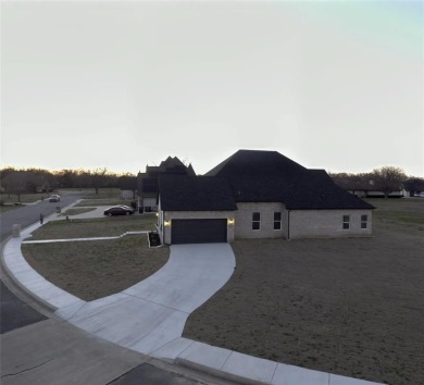 Fabulous new construction on corner lot! Ready for immediate on Legacy Ridge Country Club in Texas - for sale on GolfHomes.com, golf home, golf lot