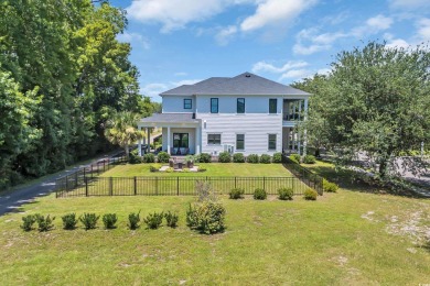 Gorgeous, custom-built home with 4 bedrooms, 3  1/2  bathrooms on Tidewater Golf Club and Plantation in South Carolina - for sale on GolfHomes.com, golf home, golf lot